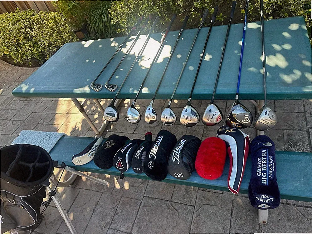 10 golf clubs. drivers, 3woods, utility, irons, new bag