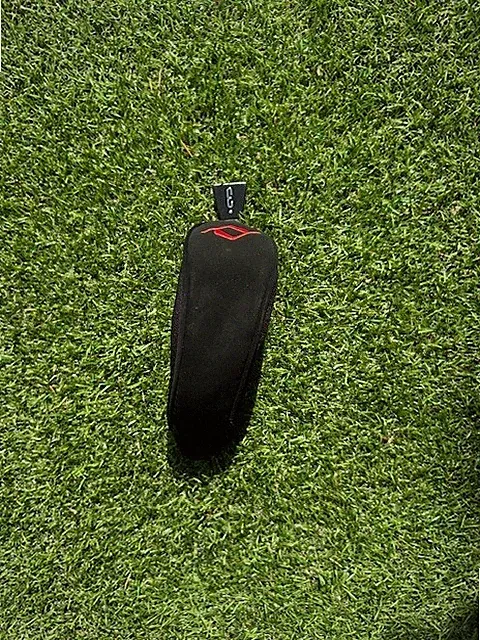Golf club head covers for 3/4 hybrid. Brand New. Black with Red accent.