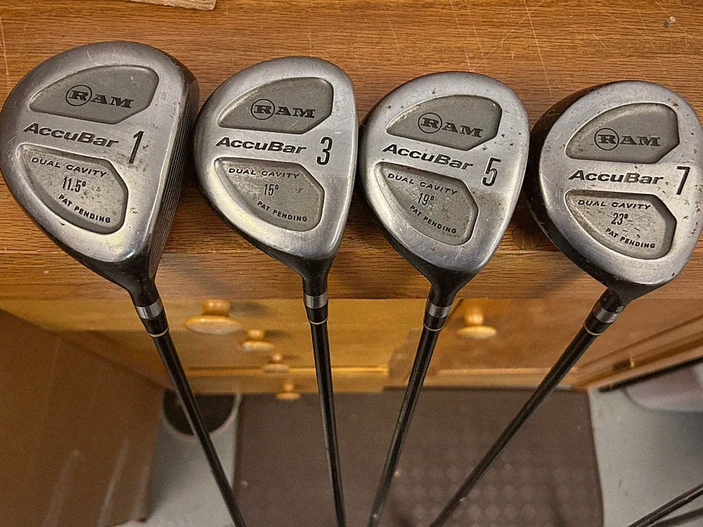 RAM Accubar Dual Cavity lot of 4 clubs 1,3,5,7 Woods RH Flex Steel shafts AP26