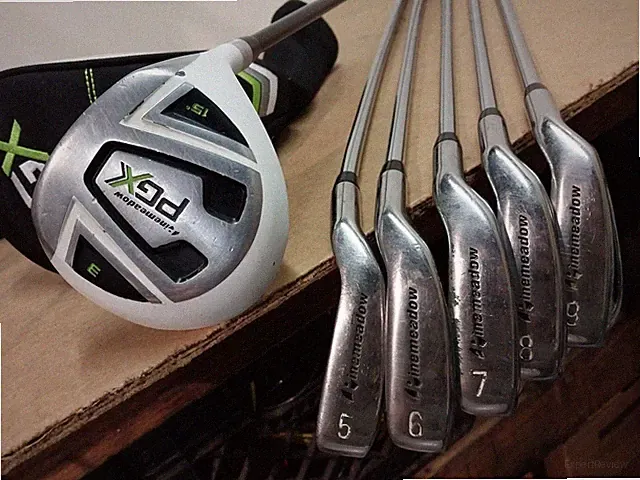 Right hand set of Pinemeadow PGX irons 5,6,7,8,9 3 wood with r flex steel shafts