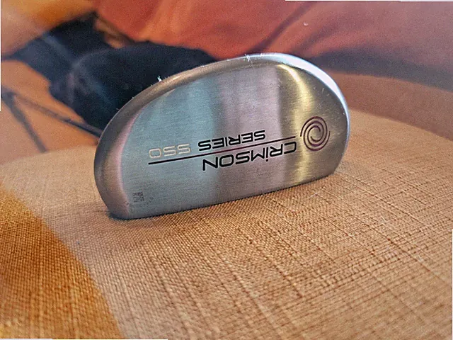 The Odyssey Crimson Series 550 is a classic, face-balanced mallet-style putter