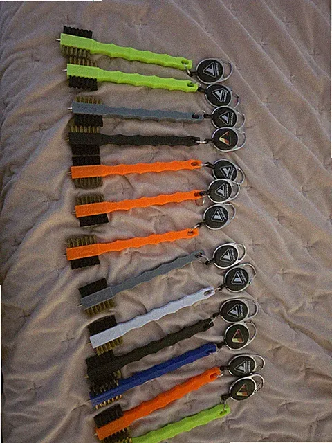 Tracer double sided cleaning brush with a bungee to attach to bag 13 brushes